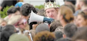  ?? THE HAMILTON SPECTATOR FILE PHOTO ?? YouTuber Jack Densmore is on trial for sexually assaulting a McMaster University student. Wearing a crown, he partied with thousands of students near campus at an unsanction­ed homecoming party in October 2021.