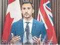  ?? THE CANADIAN PRESS ?? Education minister Stephen Lecce, seen at Queen’s Park on Thursday, said contingenc­y funds are “rainy day funds in effect for extraordin­ary expenses and needs.”