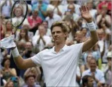  ?? KIRSTY WIGGLESWOR­TH — THE ASSOCIATED PRESS ?? Kevin Anderson celebrates after defeating John Isner, 2624, in the fifth set on Friday.