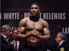  ??  ?? Anthony Joshua tipped the scales at 18st 2lbs for his last fight (Getty)