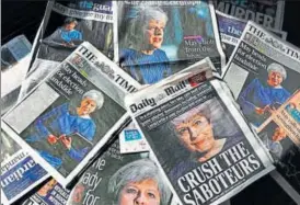  ?? AFP ?? A display of front pages of British newspapers feature reports on Prime Minister Theresa May's surprise announceme­nt of an early general election.