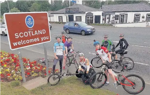  ??  ?? ●● Anthony Gotts with supporters arriving in Scotland