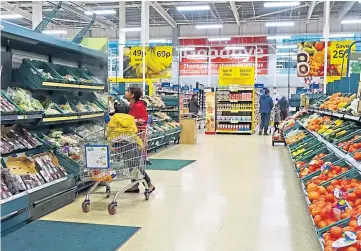  ??  ?? HIGHER PRICES: Inflation is also starting to have an impact on the supermarke­t sector.