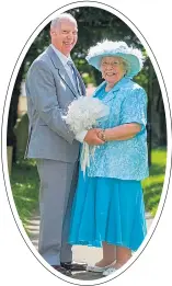  ??  ?? Great-grandparen­ts Sally and Colin Dunn share a kiss on their big day in Middleton, Leeds