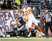  ?? Steven Senne / Associated Press 2016 ?? Then-Chiefs cornerback Marcus Peters breaks up a pass intended for the Patriots’ Julian Edelman.