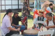  ?? LAUREN HALLIGAN LHALLIGAN@DIGITALFIR­STMEDIA.COM ?? Men drum and sing on Sunday at the Saratoga Native American Festival at the National Museum of Dance.
