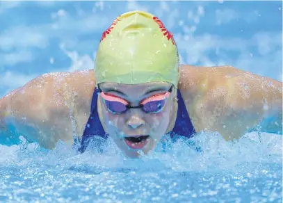  ?? Picture: Gallo Images ?? SUPER GIRL. Erin Gallagher winning gold in the Women’s 100m butterfly during day five of the SA National Swimming Championsh­ips in Gqeberha yesterday.