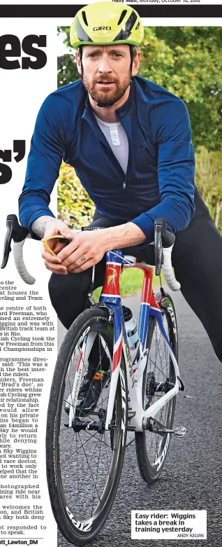  ??  ?? Easy rider: Wiggins takes a break in training yesterday