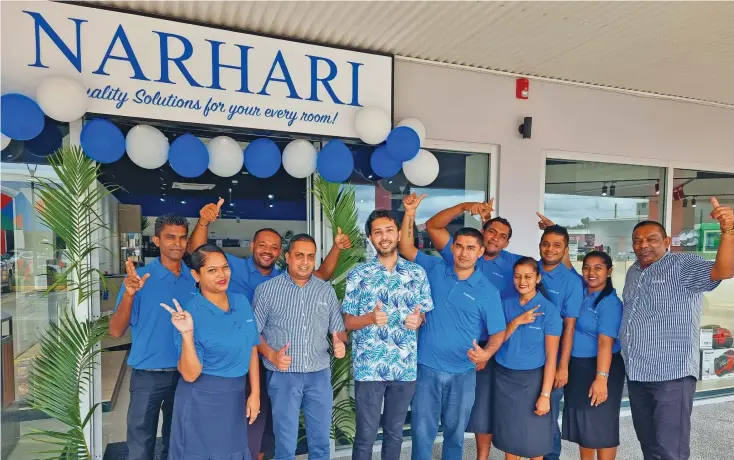  ?? Photo: Sampras Anand ?? Narhari Electrical­s associate director, Dylan Harikisun, with staff of Narhari branch at Damodar City complex in Labasa on April 5, 2024