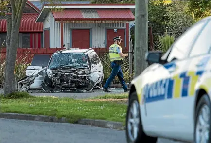  ?? PHOTO: JOSEPH JOHNSON/STUFF ?? A car came to rest on the footpath on Worcester St, on the corner of Tancred St, after a crash which involved two vehicles outside Under The Red Verandah cafe in Linwood.