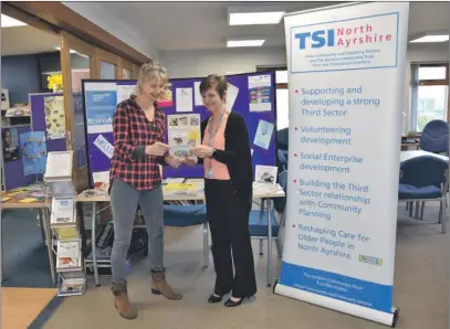  ?? 01_B49mental0­1 ?? Arran community link worker, Lorraine Hewie, pictured at an informatio­n session at Arran Library last year where she provided visitors with details on the services that are available on Arran.