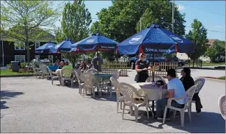  ??  ?? David Lahousse has made adjustment­s to operate Kay’s Restaurant under the pandemic, including take-out service only since St Patrick’s Day, and now outside dining with beverages in the restaurant’s parking lot.