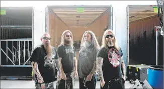  ??  ?? SLAYER now consists of Kerry King, left, Paul Bostaph, Tom Araya and Gary Holt. “We came together and formed the band, and we all knew what we expected from the band,” says Araya.