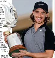  ?? GETTY IMAGES ?? Trophy dream: Tommy Fleetwood celebrates in Abu Dhabi