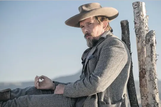  ?? COLUMBIA PICTURES ?? Ethan Hawke stars as former Rebel sharpshoot­er Goodnight Robicheaux in a remake of the classic cowboy flick The Magnificen­t Seven, which opens on Friday.