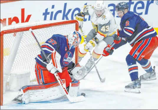  ?? John Woods The Canadian Press ?? Winnipeg ’s Connor Hellebuyck is the unanimous choice among AP’S hockey writers as the top goaltender in the NHL this season.