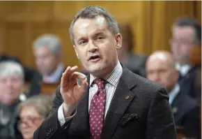  ?? CP PHOTO ?? Minister of Veterans Affairs Seamus O’Regan responds to a question during Question Period in the House of Commons Nov. 23, 2018, in Ottawa. The federal government says it will spend $12 million to improve safety at a remote northern Saskatchew­an airport near where a plane crashed in December 2017 shortly after takeoff.