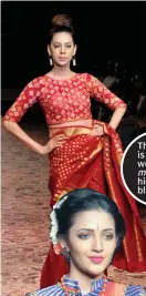  ??  ?? The model is seen wearing a matka cut high neck blouse