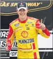  ?? ORLIN WAGNER — THE ASSOCIATED PRESS ?? Joey Logano celebrates winning Sunday’s NASCAR Cup Series race at Kansas Speedway.