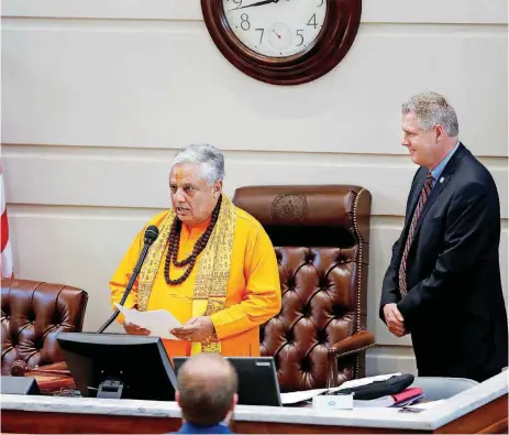  ?? [PHOTO BY JIM BECKEL, THE OKLAHOMAN] ?? Hindu statesman Rajan Zed delivers the invocation in Senate Chambers on Monday at the state Capitol as Sen. Gary Stanislaws­ki, R-Tulsa, looks on. See related story on Page 5A.