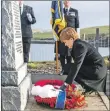  ??  ?? Top, the First Minister meets those attending the Iolaire service on January 1; the Last Post is played during the ceremony; Nicola Sturgeon lays a wreath at the memorial.