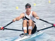  ?? Photo: Stu Piddington/FairfaxNZ ?? Family fortunes: Mahe Drysdale celebrates his single scull win with baby Bronte and wife Juliette.