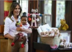  ?? CAROLYN KASTER - THE ASSOCIATED PRESS ?? First lady Melania Trump visits the Nest Orphanage in Limuru, Kenya, Friday, Oct. 5. Melania Trump has fed baby elephants as she visits a national park in Kenya to highlight conservati­on efforts. The U.S. first lady also went on a quick safari. Mrs. Trump is on her first-ever visit to Africa and her first extended solo internatio­nal trip as first lady.