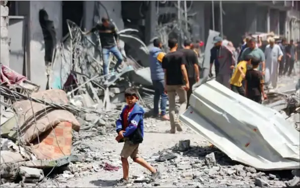  ?? [ANADOLU AGENCY] ?? Buildings are destroyed and surroundin­g buildings and vehicles were heavily damaged at al-Daraj neighbourh­ood after Israeli attack, in Gaza City, on April 22, 2024.