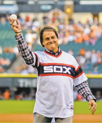  ?? Matt Marton / Associated Press 2014 ?? Tony La Russa throws out the ceremonial first pitch before a White Sox game in 2014. He was hired Thursday to manage the Sox, the team that gave him his start back in 1979.