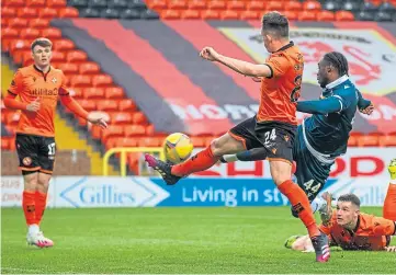  ??  ?? PROMISE: Archie Meekison and Lawrence Shankland celebrate as United take the lead, before Devante Cole scored for Motherwell.