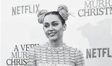  ?? ASSOCIATED PRESS FILE PHOTO ?? Singer and actress Miley Cyrus attends Netflix’s “A Very Murray Christmas” premiere in New York in 2015. In the October issue of Elle magazine, out Wednesday, Cyrus said she would never walk a red carpet again.