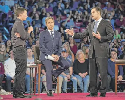  ?? | MICHAEL LAUGHLIN/ SOUTH FLORIDA SUN- SENTINEL VIA AP ?? Marjory Stoneman Douglas High School student Cameron Kasky asks a question to Florida Republican Sen. Marco Rubio during a CNN town hall meeting Feb. 21 in Sunrise, Florida.