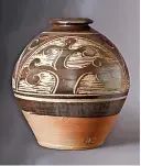  ?? ?? Right, a Bernard Leach stoneware Tree of Life vase sold for £12,000