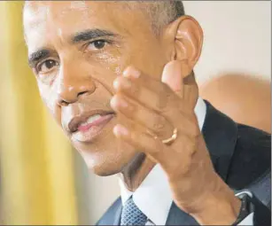  ?? AP PHOTO ?? His cheek wet with tears, U.S. President Barack Obama President Barack Obama recalls the 20 first-graders killed in 2012 at Sandy Hook Elementary School, while speaking in the East Room of the White House in Washington Tuesday about steps his...