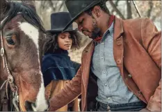  ?? David Lee/Netflix ?? Zazie Beetz and Jonathan Majors in “The Harder They Fall.”