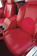  ??  ?? A SET OF CHEVY AVALANCHE SEATS WAS SWAPPED INTO JULIO’S TRUCK FOR A BIT MORE SUPPORT THAN THE ORIGINAL BASE MODELS, AND THEY LOOK AMAZING IN RED SUEDE AND ULTRA-LEATHER.