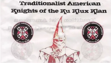  ?? COURTESY JAIMI HAJZUS ?? Residents of Couderspor­t, Penn., awoke Saturday to find bags with pro-KKK missives distribute­d on their lawns.