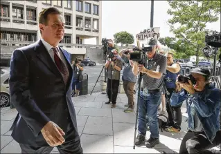  ?? AARON P. BERNSTEIN / BLOOMBERG ?? Paul Manafort, ex-campaign manager for Donald Trump, arrives Friday at federal court in Washington. A judge said sending Manafort to jail was “an extraordin­arily difficult decision.”