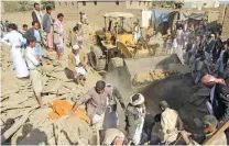  ?? – Reuters ?? DEADLY ATTACK: People search for victims under the rubble of houses destroyed by a Saudi-led air strike in the northweste­rn city of Saada, Yemen on Wednesday.