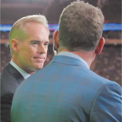  ?? AP FILE PHOTO ?? Joe Buck, left, talks to Troy Aikman before an NFL football game between the New York Giants and the Philadelph­ia Eagles on Oct. 11, 2018, in East Rutherford, N.J.