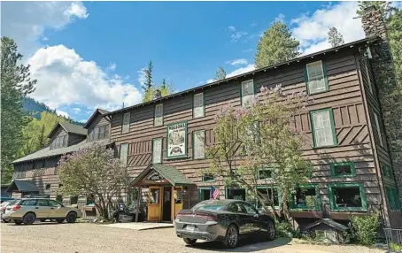  ?? JACKIE VARRIANO/SEATTLE TIMES PHOTOS ?? The main building of the Wallowa Lake Lodge in Joseph, Oregon, was built in 1923 using timber from the property.