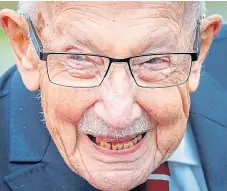  ?? Picture: PA. ?? Centenaria­n Captain Sir Tom Moore famously raised £33 million for the NHS.