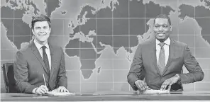  ?? WILL HEATH/NBC ?? Jost and Che man the “Weekend Update” desk in Saturday Night Live.”