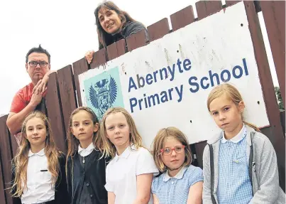  ?? Picture: Mhairi Edwards. ?? Chairman and treasurer of the Parents’ Council, Gerard McGoldrick and Claudia Lacoux with pupils Elle Lacoux, 10, Lucy MacGregor, 8, Anna McGoldrick, 9, Bea Meldrum, 9, and Maya King, 9.