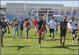  ?? Contribute­d ?? Lancaster High School student-athletes stretch before competing in the inaugural Eagle Games put on by the Athletic Leadership Program and its coordinato­r Ron Wilson last Thursday.