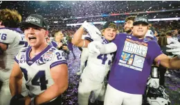  ?? ROSS D. FRANKLIN/AP ?? TCU players celebrate after their triumph at the Fiesta Bowl vs. Michigan.