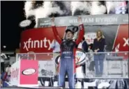  ?? TERRY RENNA — THE ASSOCIATED PRESS ?? William Byron celebrates in Victory Lane after winning the NASCAR Xfinity Series auto racing season championsh­ip, Saturday at Homestead-Miami Speedway in Homestead, Fla.