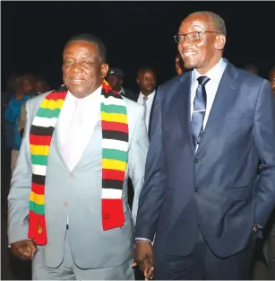  ?? — Picture: Justin Mutenda ?? President Mnangagwa is welcomed by Vice President Kembo Mohadi at Robert Gabriel Mugabe Internatio­nal Airport in Harare yesterday on arrival from the 74th Ordinary Session of the United Nations General Assembly in New York, United States of America.