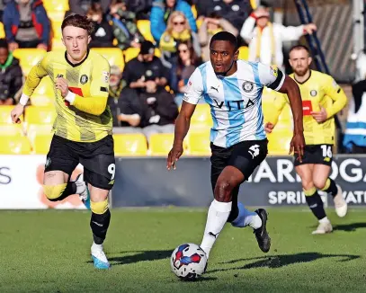  ?? Www.mphotograp­hic.co.uk ?? ●●Akil Wright drives forward against Harrogate Town at the weekend