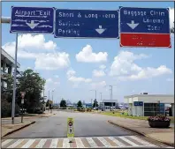  ?? Arkansas Democrat-Gazette/NOEL OMAN ?? The 41 overhead signs at Bill and Hillary Clinton National Airport/ Adams Field are about 18 years old, said Shane Carter, the Little Rock airport’s spokesman.